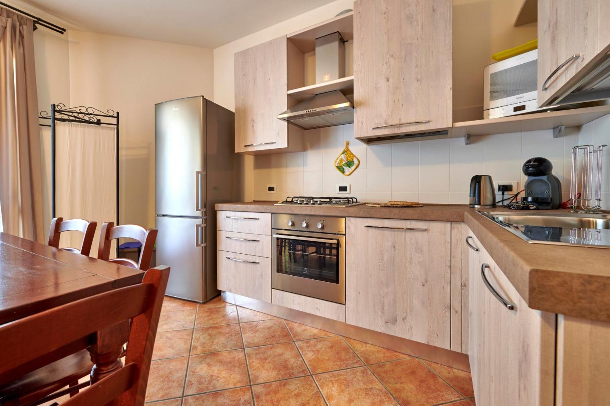 Apartmentsgarda - Baia D'Argento Residence كوسترمانو المظهر الخارجي الصورة